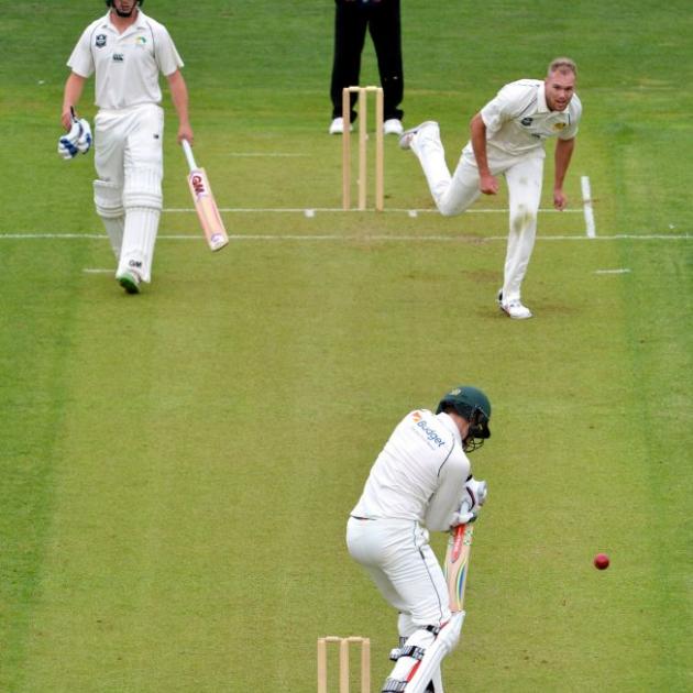 Otago Volts bowler Christi Vijoen sends down a delivery to Central  Stags batsman Mitchell Renwick during the first day of a Plunket  Shield match at the University Oval in Dunedin yesterday. The  batsman at the non-striker’s end is Will Young. Photo by