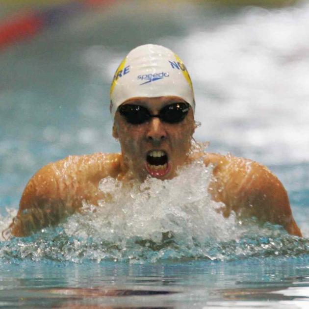 Surging towards Beijing . . . Dean Kent, of North Shore, competes in the men's 200m individual...