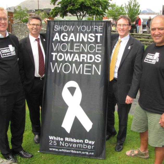 White Ribbon Day supporters (from left) Mactodd partner, Clark Pirie, Berry and Co partner,...