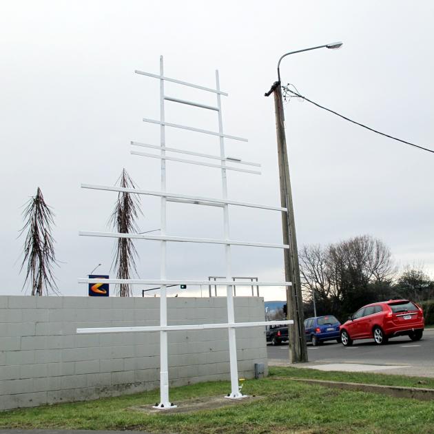 The frame went up for the revitalised Welcome to Mosgiel sign on Gordon Rd on Friday. Now all it needs is finished artwork and some new plaques from service clubs. Photo by staff photographer.