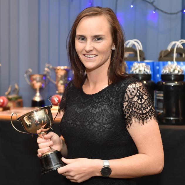 Otago Sparks player Katey Martin with one of the awards she received at the Otago cricket awards at the University Rugby Club rooms at the University Oval last night. Photo by Gregor Richardson.