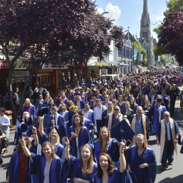 Otago Polytechnic graduands march along George St to their graduation last year. PHOTO: GERARD O...