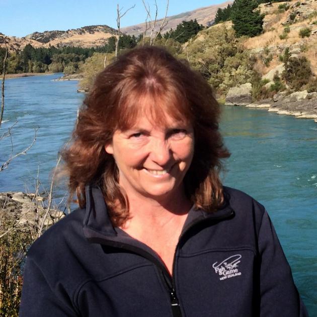 Otago Fish and Game councillor Vicky White is flanked by the Clutha River near her home town of...