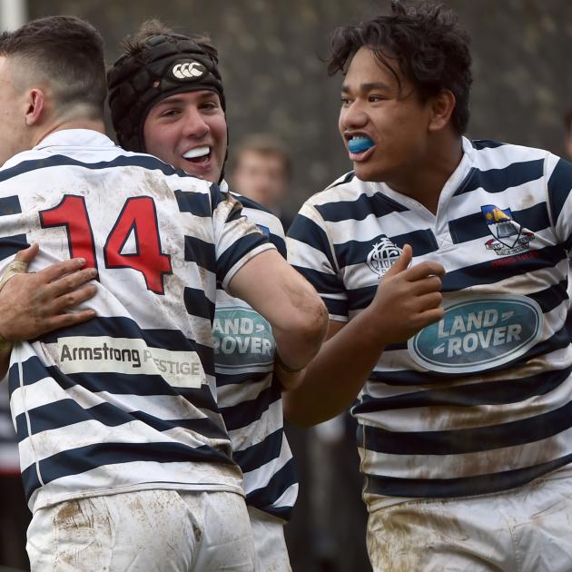 Otago Boys' High School players celebrate during the match against Christchurch Boys' High. Photo...
