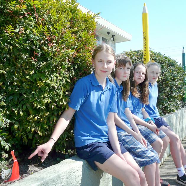 Balclutha Primary School prefects (from left) Kayley Strachan and Leticia Cochrane (both 13), and...