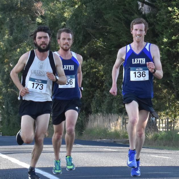 Jonah Smith (left), Jason Palmer (centre) and defending champion Nic Bathgate pull away from the...