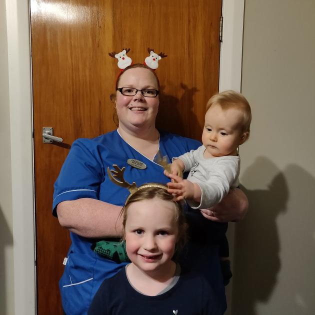 Dunedin Hospital duty manager Angeline Walker, pictured with children Zafrina (6) and Tyrian (13...