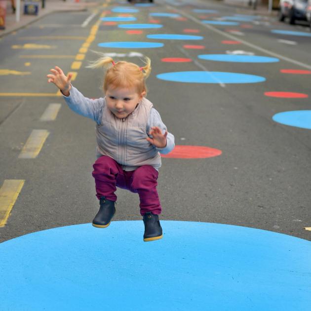 Faith Bishop (1) plays on one of the spots in George St. Her mother Caroline is concerned it...