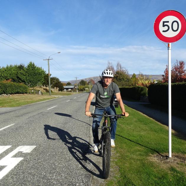 Wanaka Active Transport spokesman Simon Telfer cycles past one of the
...