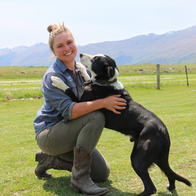 Fairlight Foundation executive director Laura Douglas and her dog, Lad, prepare for the opening...