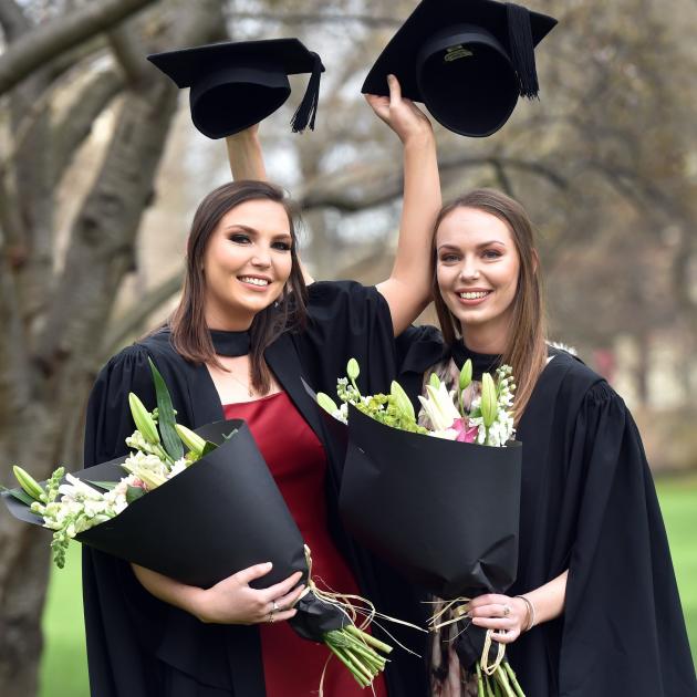 Sisters Rachel (left) and Sarah Lister (25), of Dunedin, mark having gained a bachelor of...