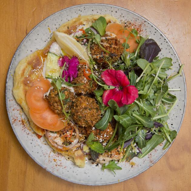 Falafel pictured as summer falafel flatbread.