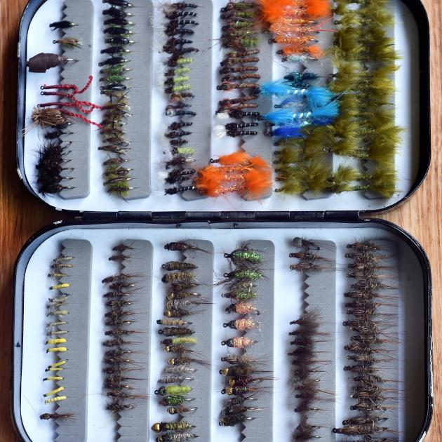 Mike Weddell’s kit of fly lures used to tempt a fish. 
