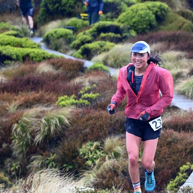 First woman home Nancy Jiang, of Auckland, heads towards the Luxmore Hut on the 2020 Kepler...