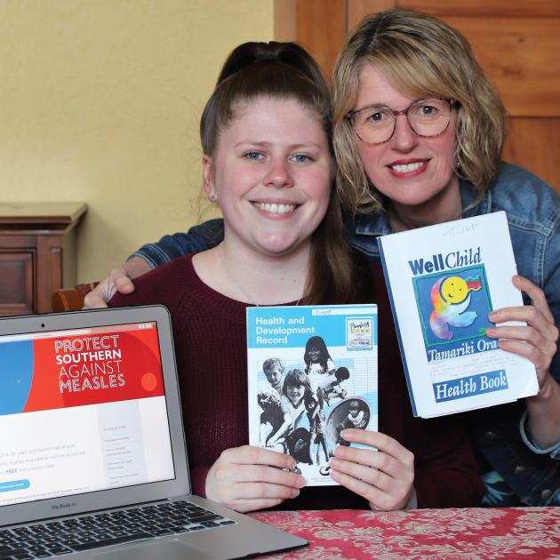 Eirwen Mitchell and daughter Samantha Tulett hunt out old records to upload