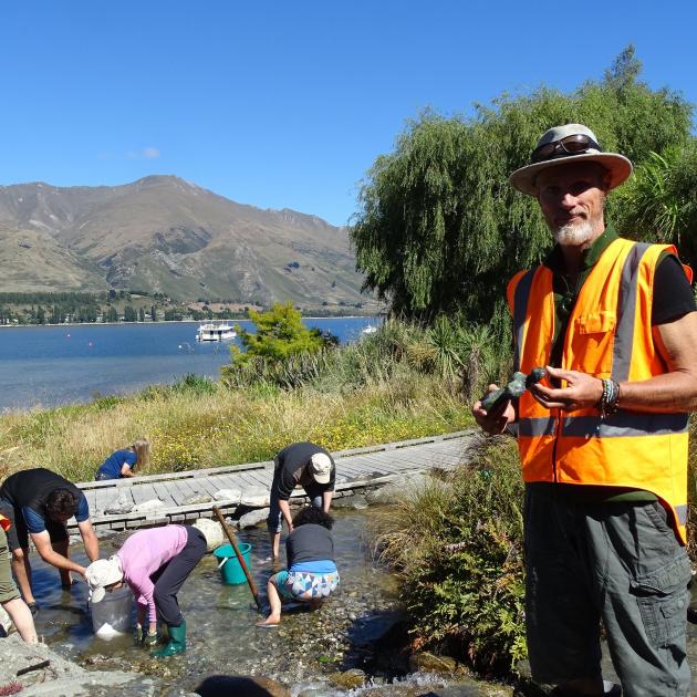 Organiser Richard Windelov holds a water goddess sculpture he made for the Wanaka community...