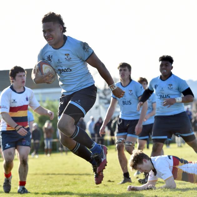 Heading to the try line for the King’s High School First XV last year is big No 8 Joji Buli in a...