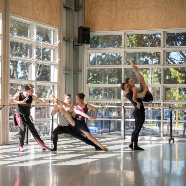 Choreographer Loughlan Prior (left) works with Royal New Zealand Ballet dancers on Ultra Violet....