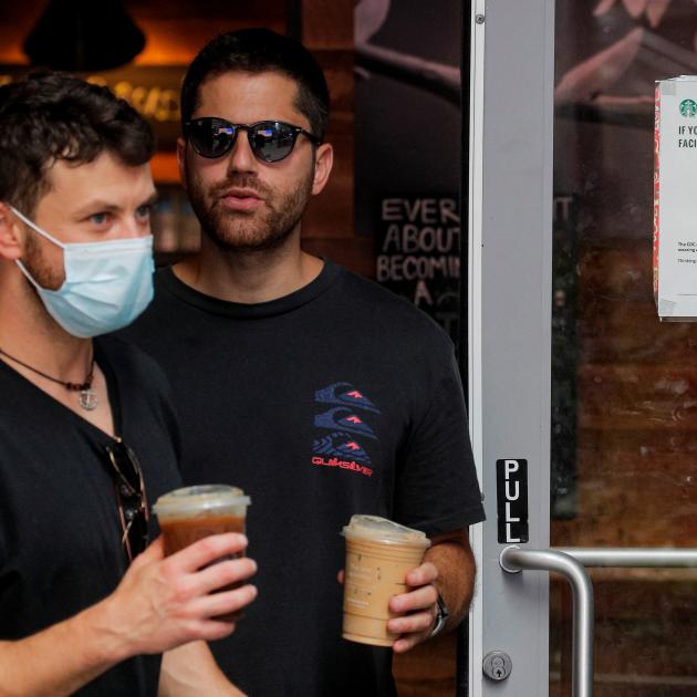 People wearing masks in Times Square, New York. Photo: Reuters