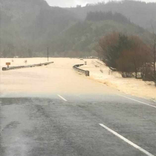 Aerial photographs have revealed the scope of the devastating damage cause by the fire at Lake Ohau. Photo: PoolSH6 just before Canvastown, which is between the Pelorus Bridge and Havelock, water over the road is at least 1.5m deep and strong flowing. Pho