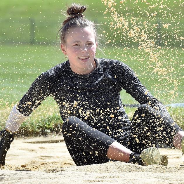 Paralympic long jumper Anna Grimaldi trains at the Caledonian Ground in Dunedin yesterday. PHOTO:...