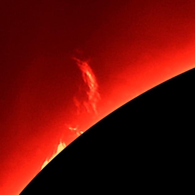 A big prominence exploding on the north east limb of the sun, estimated to be as high as five or...