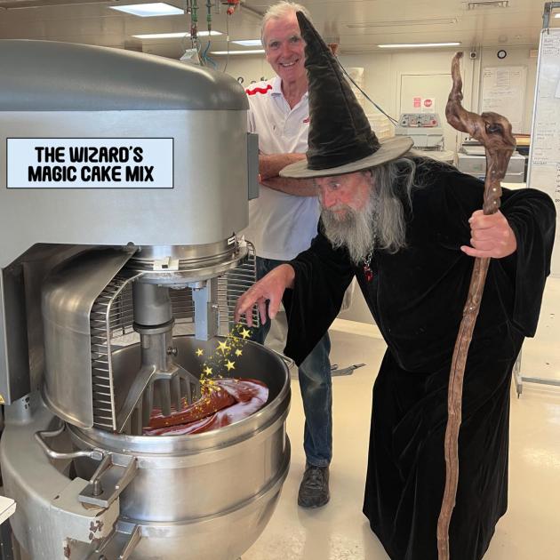 The Wizard sprinkling some star dust into his birthday cake. Photo: Kidd's Cakes and Bakery