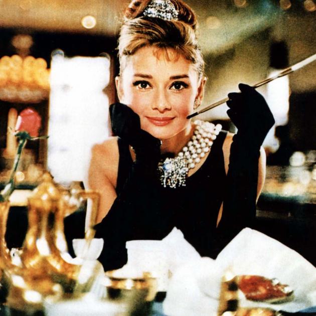 Audrey Hepburn wears Givenchy with gloves in the 1961 film Breakfast At Tiffany’s.