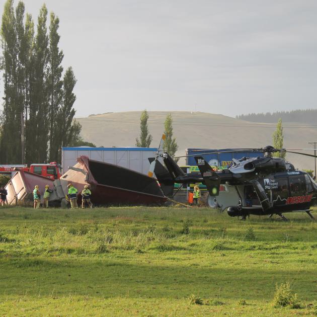 Emergency services at the scene of a truck crash south of Milton this morning. Photo: Nick Brook