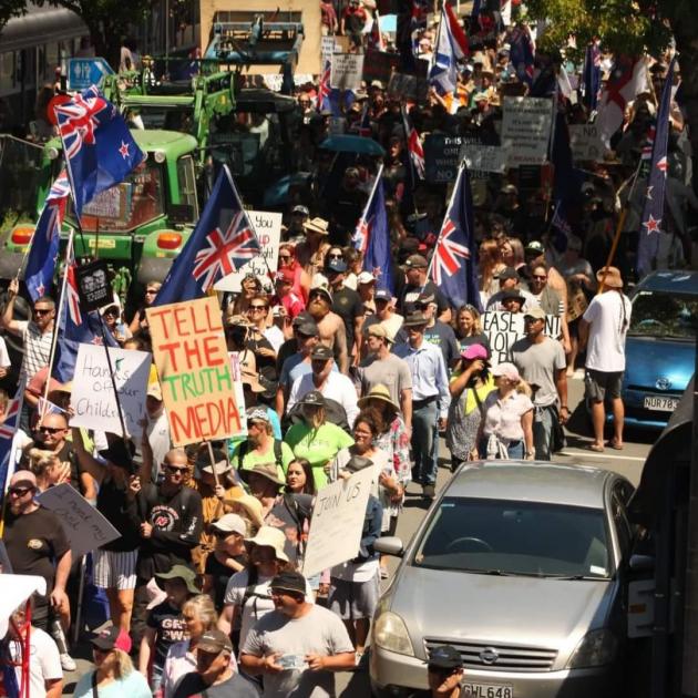 Demonstrators march through Rangiora's High St at the weekend. Photo: Kieran Mitchell