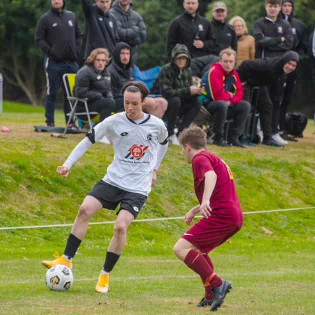 Jamie Le Comte (left) in action for Roslyn-Wakari last season. PHOTO: PAUL LE COMTE
