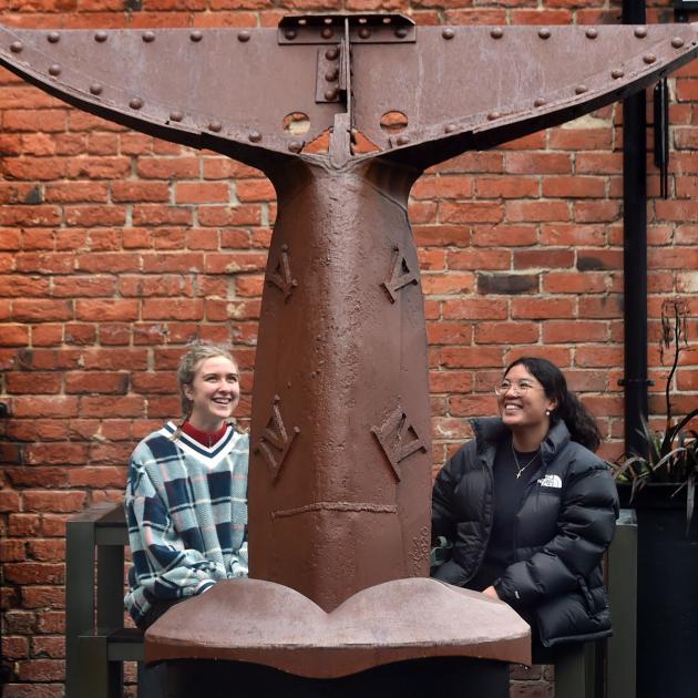 Anastasiia Viazenko (left) and Diane Vidallon admire Lawrie Forbes’ Toru sculpture which resides...