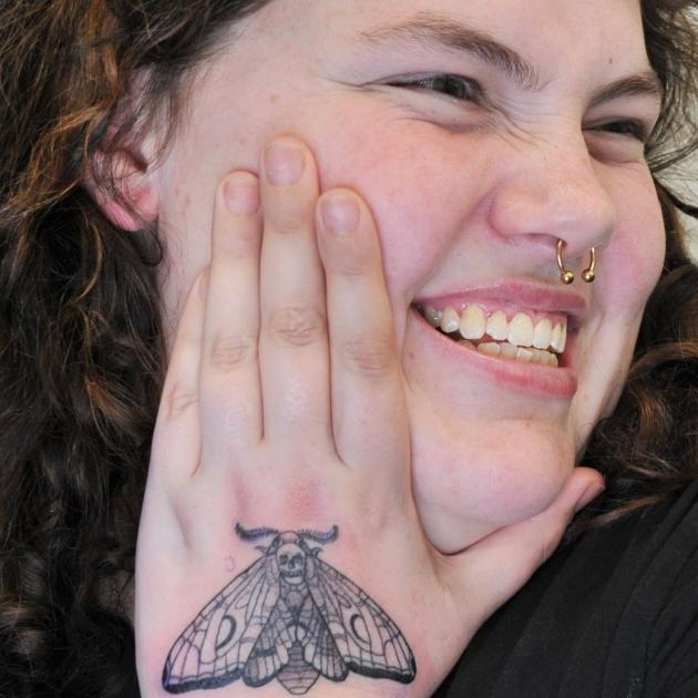 Like moths to a flame, punters converge for cut-price tattoos | Otago ...