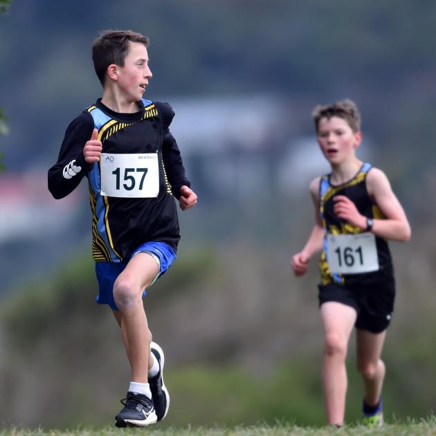 Connor Broom looks over his shoulder for his mate William Bolter during the 2.5km race.