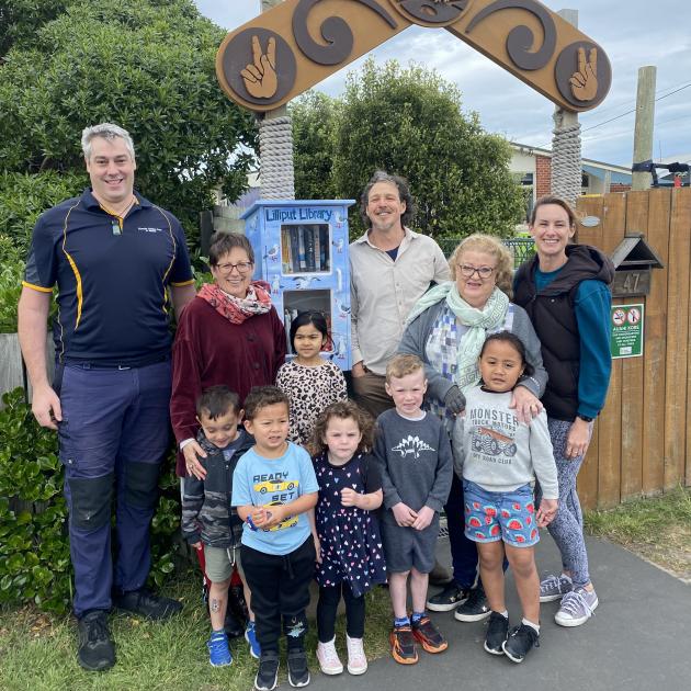 Welcoming the creation of an extra-large Lilliput Library at St Kilda Kindergarten are (back,...