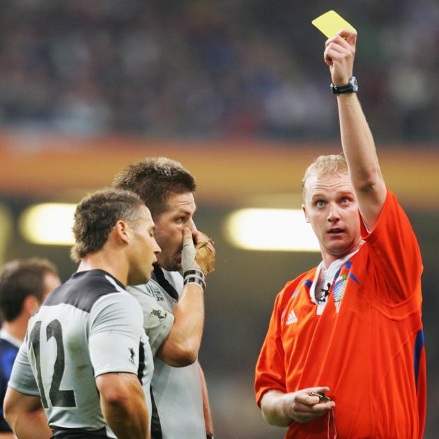 Wayne Barnes awards sends Luke McAlister to the sin bin in the All Blacks' 2007 Rugby World Cup...