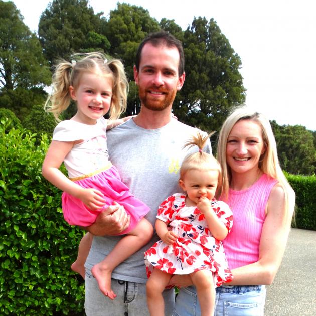 Shane Freiberg, Kelly Churchill, Maisie, 3, and Chloe, 1, have traded in Auckland’s traffic woes...