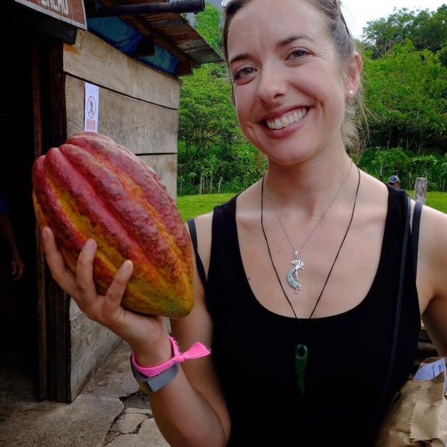 Elle Coco in Guatemala in 2018 with what she thinks might be the world’s largest cacao pod....