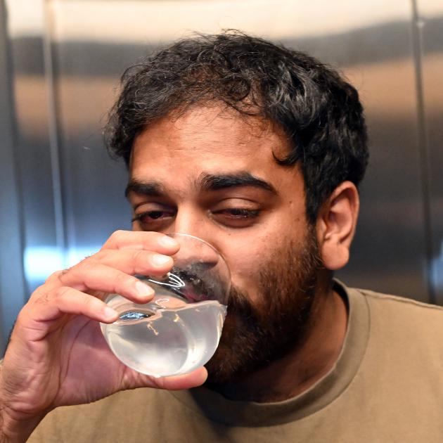 Otago Daily Times reporter Mark John takes on water during the Dunedin Chilli Eating Champs 2024...