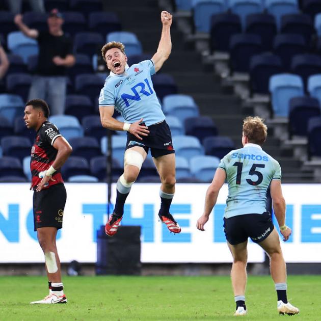Will Harrison celebrates kicking the winning field goal in golden point for the Waratahs in...