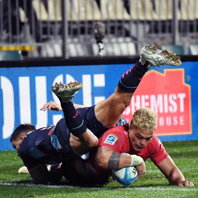 Christian Lio-Willie dives over to score one of his two tries in Christchurch tonight. Photo:...