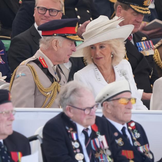 Britain's King Charles and Queen Camilla attend the UK national commemorative event for the 80th...