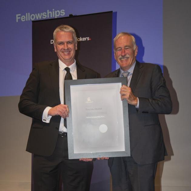 New chartered fellow Tony Marshall (left) with Chartered Accountants Association vice-president...