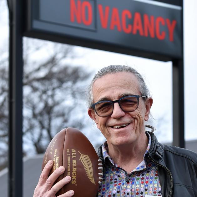 Otago Motel Association president Peter Firns in front of his motel, which is expected to have a...