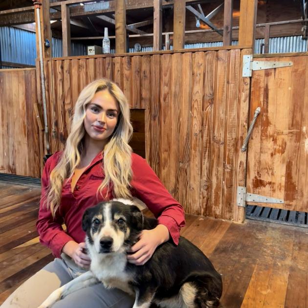 Trainee livestock agent Hayley MacDonald, 21, with a friend’s dog called Sky. A few jobs outside...