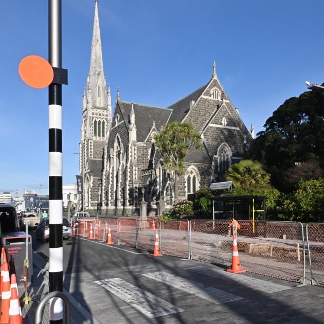 Road cones are back in the Knox block of George St, Dunedin, within a year of the upgraded...