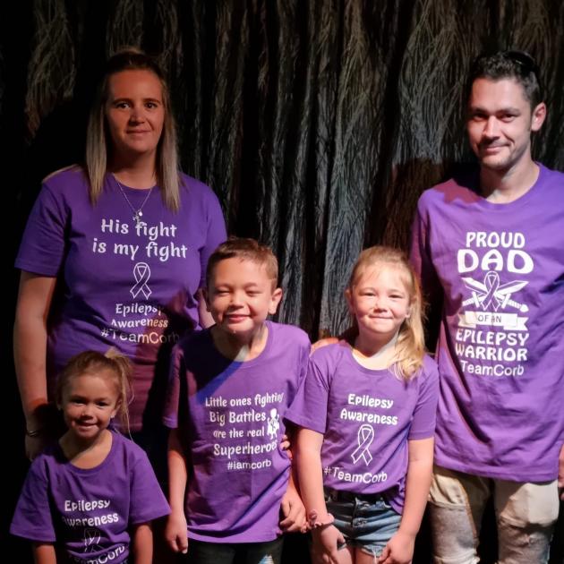The Belt family, parents Melissa and Travis, and children (from left) Kenzie, 6, Corbin, 11 and...