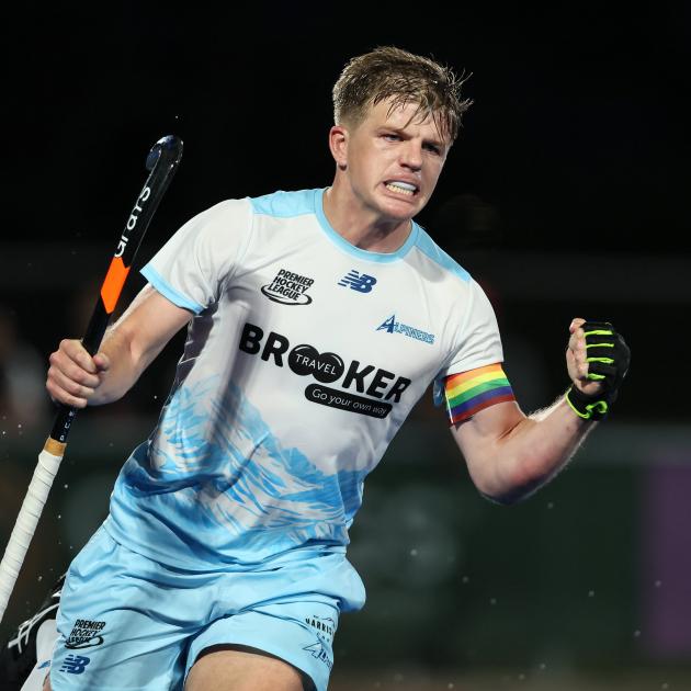 Alpiners striker Sam Lane celebrates after scoring against the Falcons in the final of the...