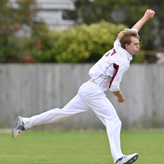 North East Valley's Shaedon Miller sends one down against Albion at Tonga Park on Saturday. PHOTO...