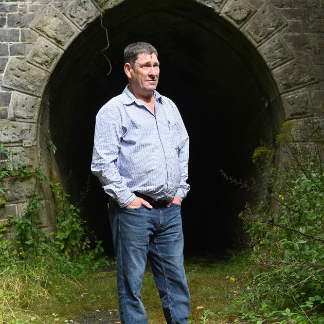 The new Dunedin Tunnels Trail Trust chairman Brent Irving stands outside the entrance to the...